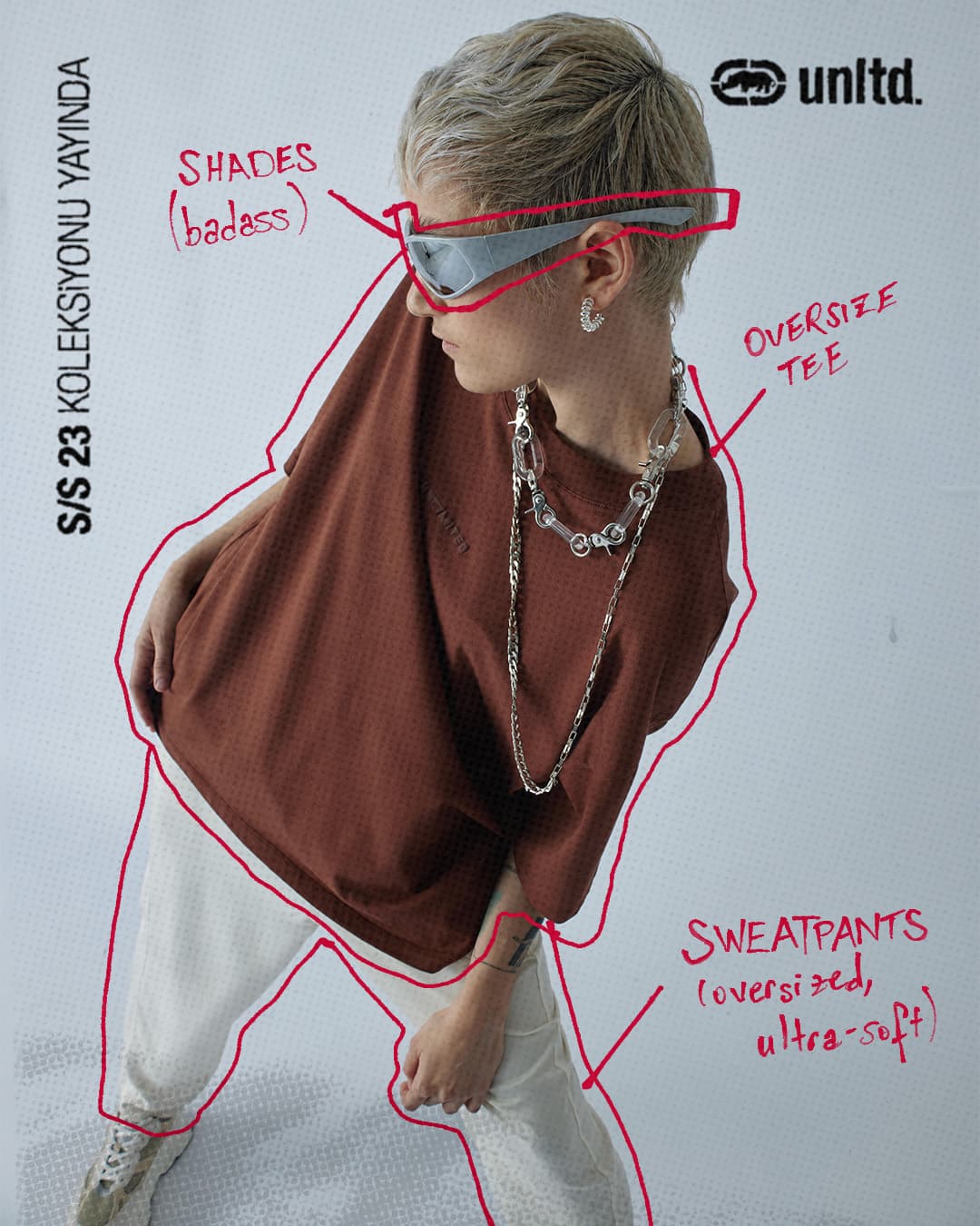 An Instagram post: a model in a brown oversize tee, outlined and labelled in red marker: shades, oversize tee, sweatpants